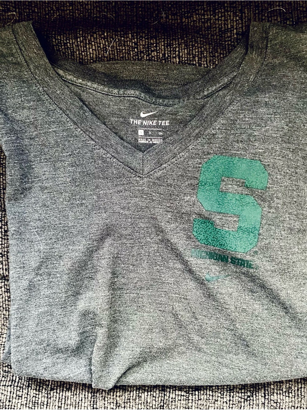 Nike Gray V-Neck Short Sleeve Tee with Green 'S' Graphic
Michigan State